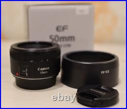 Canon 50mm 1.8 stm ef-s Mint condition. Box, Documents, Lens Hood