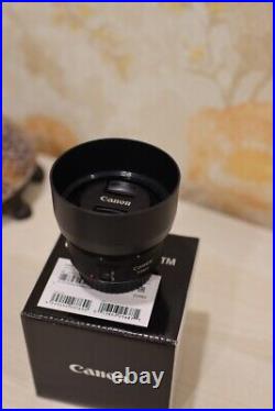 Canon 50mm 1.8 stm ef-s Mint condition. Box, Documents, Lens Hood